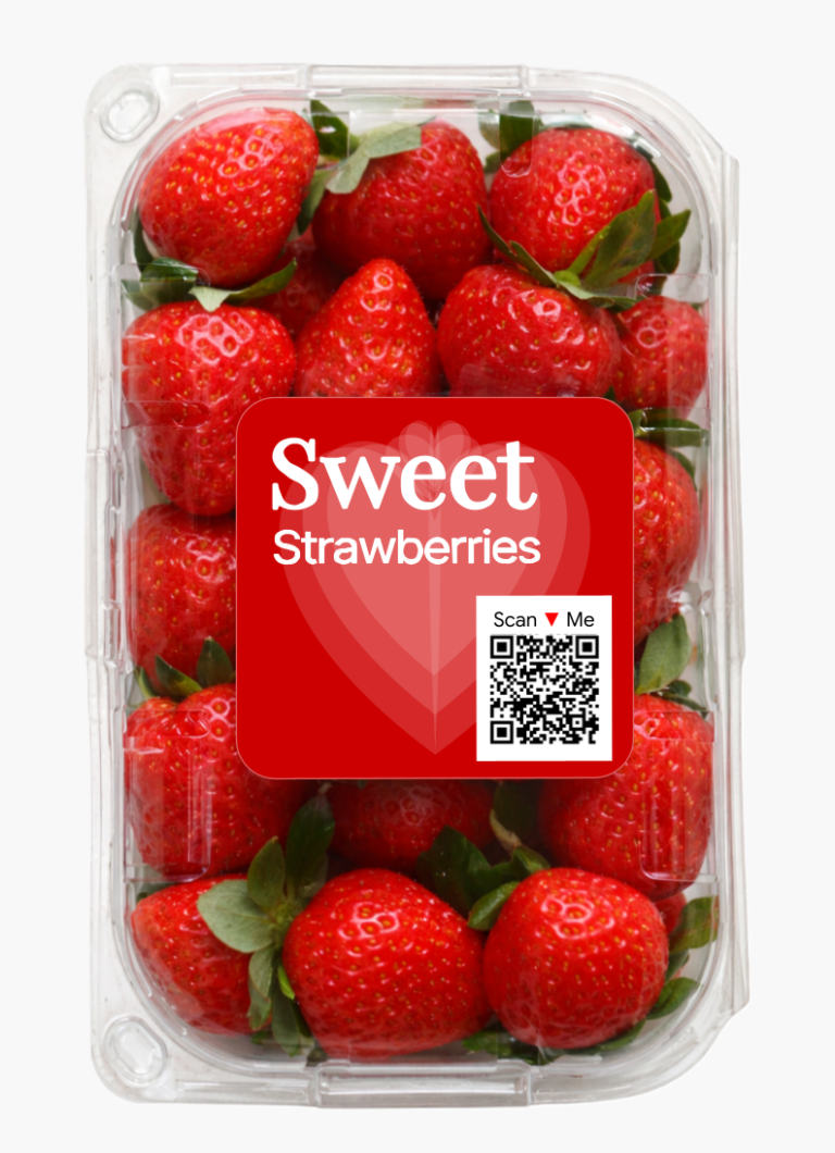 A clamshell container of strawberries featuring a scannable QR code label for traceability solutions for fresh produce.