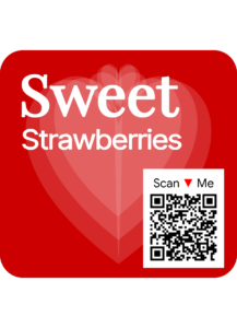 Close-up of labels with scannable QR codes for blueberries, strawberries, and grapes, powered by traceability solutions for fresh produce.